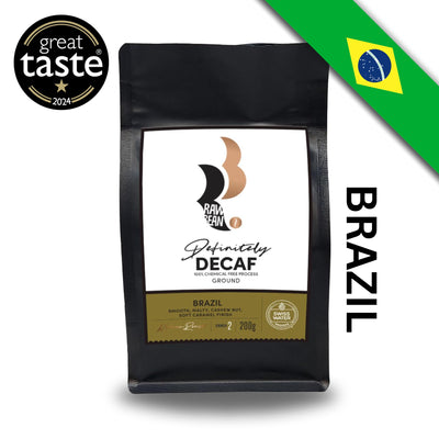 Great Taste award winning Brazilian Definitely Decaf by Raw Bean. Swiss Water 100% Chemical Free Process. Ground Coffee 200g. Tasting Notes: smooth, malty, cashew nut, soft caramel finish. Medium Roast. Strength 2. 