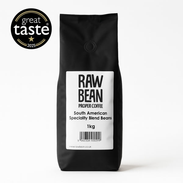 1 kg matt black bag of Raw Bean Proper Coffee South American Specialty Blend Beans with a 2025 Great Taste Award