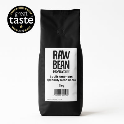 1 kg matt black bag of Raw Bean Proper Coffee South American Specialty Blend Beans with a 2025 Great Taste Award