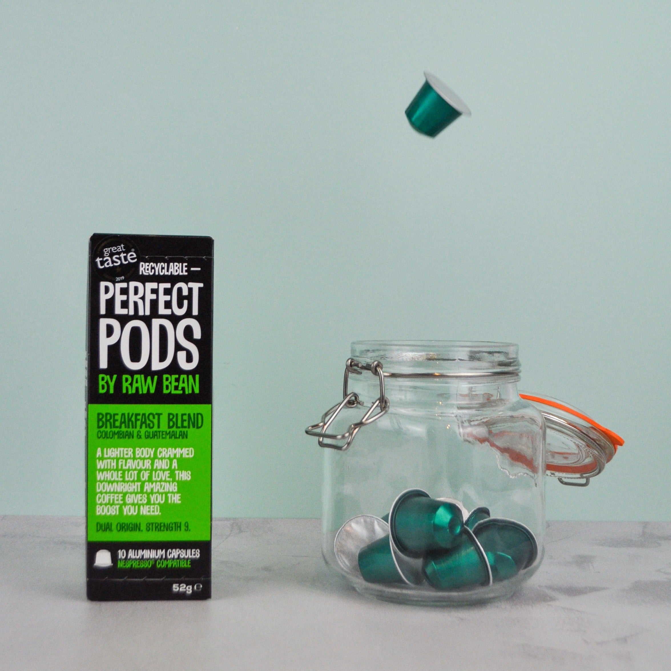 Great Taste Award winning Raw Bean Perfect Pods Breakfast Blend coffee pod falling into kilner jar