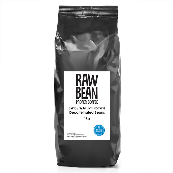 bag of swiss water decaf coffee beans in a black bag with a white raw bean label